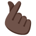 hand_with_index_finger_and_thumb_crossed_tone5